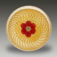 Chinese flower on spiral latticino paperweight